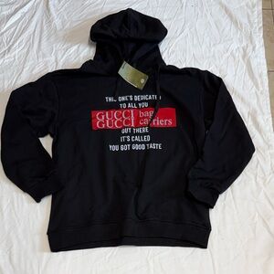 Black Sweater with Red Accents